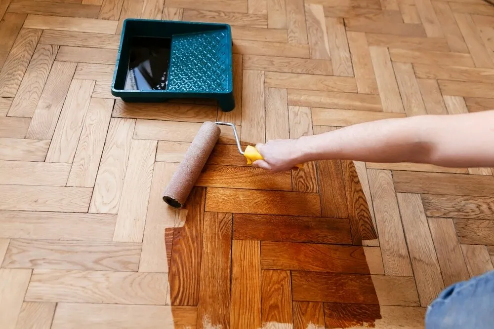 how much does it cost to restain hardwood floors